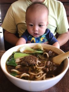 Henry admiring the food that he can't eat quite yet. 