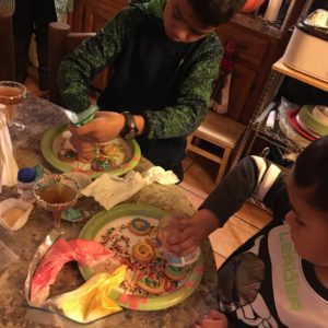 Decorating cookies and sipping on some apple juice. 