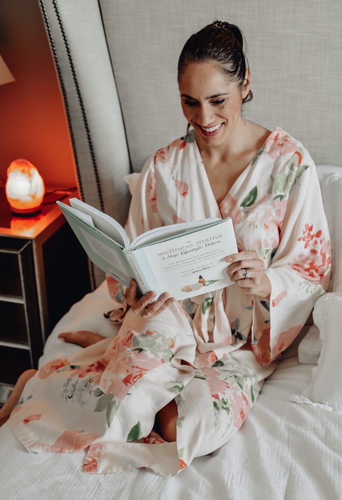 Natalie Reading with Salt Lamp On