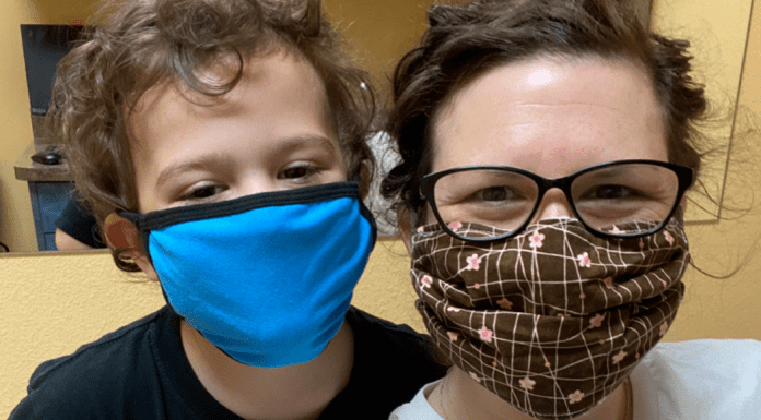 Mom and son wearing masks