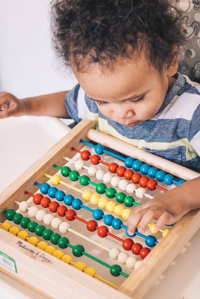 Toddler behavior working on puzzle