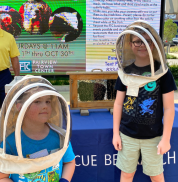 kids wearing beekeeping hats at Critter Club presentation