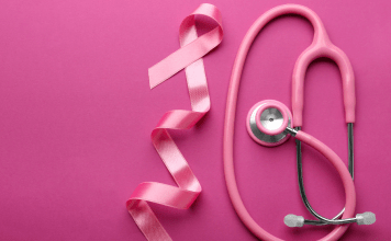 Pink breast cancer ribbon and pink stethoscope for breast cancer awareness