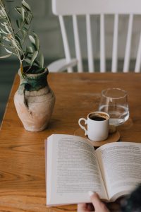 reading a book with a cup of coffee, self care ideas for moms