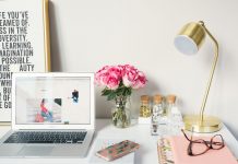 pretty desk with flowers and laptop, quit your job and change careers