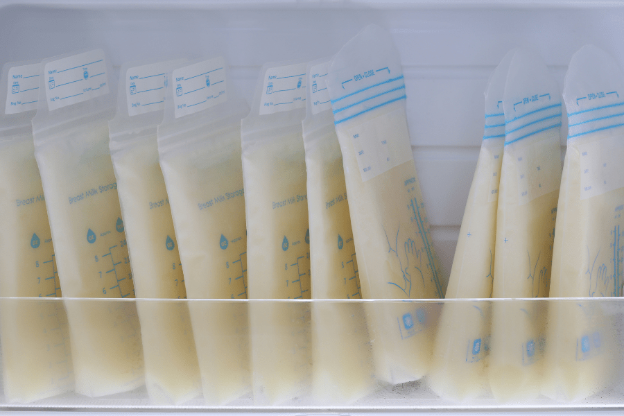 A tray of frozen breast milk bags.