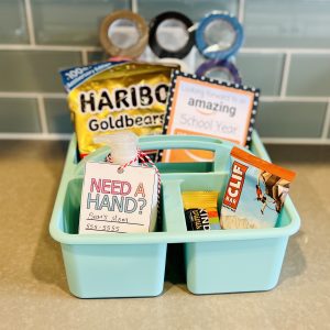 collection of back-to-school teacher gifts in cute bin