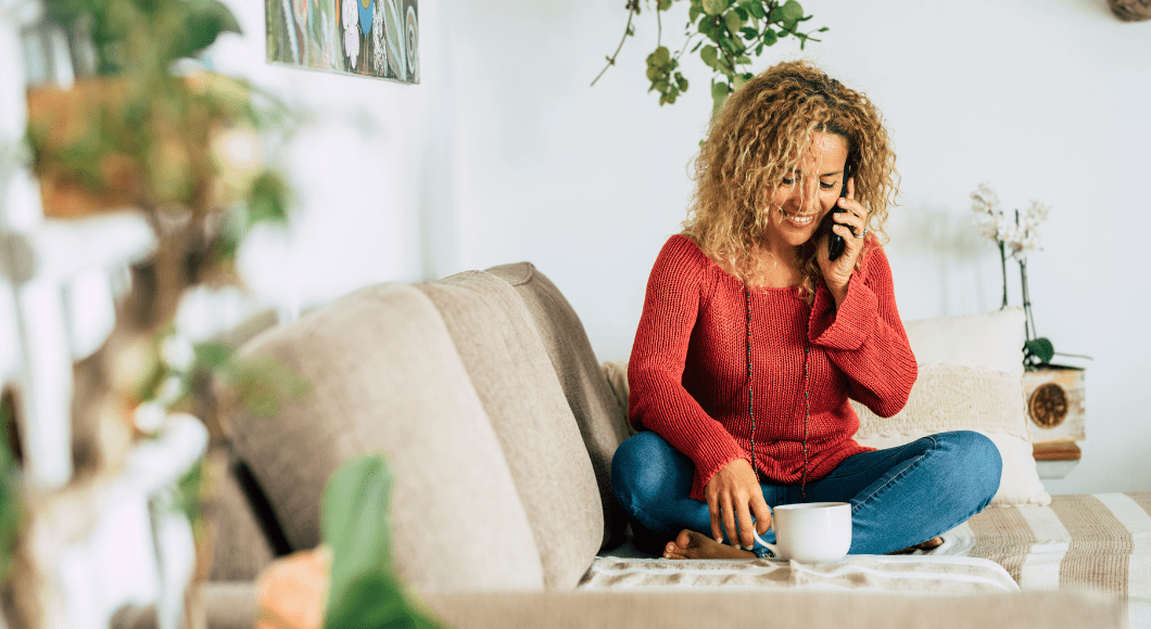 A woman talks on the phone.