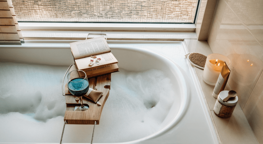 relaxing bubble bath with carrier for book and wine