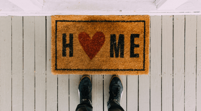 A doormat with the word "home" on it.