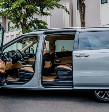 A minivan with all the doors open.