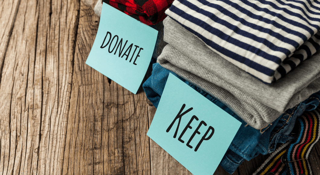 Clothes sorted into two piles: keep and donate