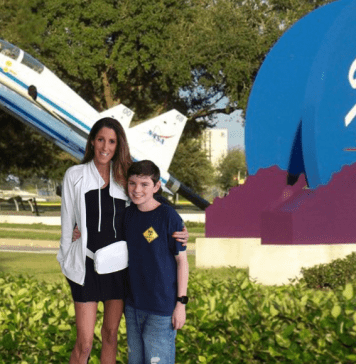 Mom and son visiting Space Center Houston
