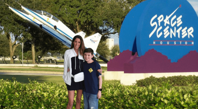 Mom and son visiting Space Center Houston