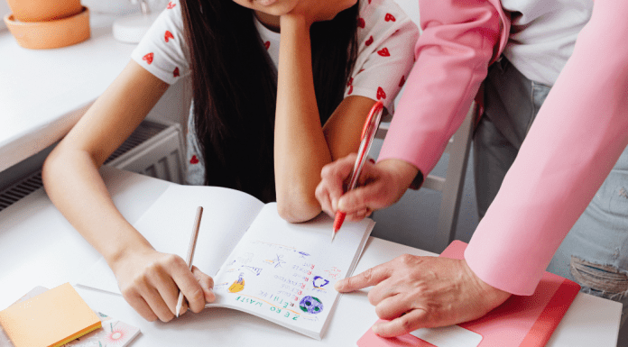 mother helping daughter with homework