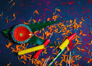 Diwali diya, confetti, and firecrackers