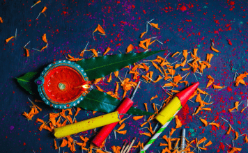 Diwali diya, confetti, and firecrackers