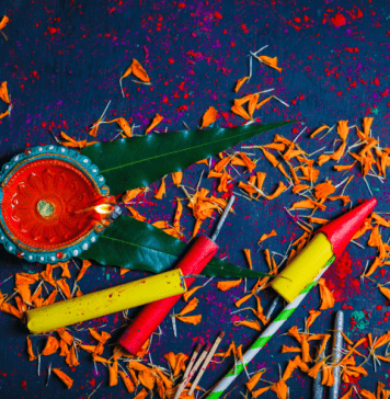 Diwali diya, confetti, and firecrackers